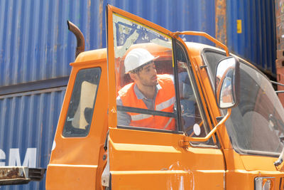 Portrait of man working in bus