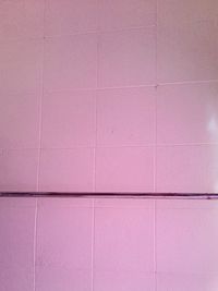 Full frame shot of pink tiled floor