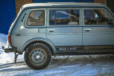 Car on snow covered land