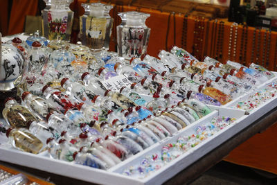 High angle view of bottles on table at market