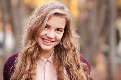 Portrait of smiling young woman