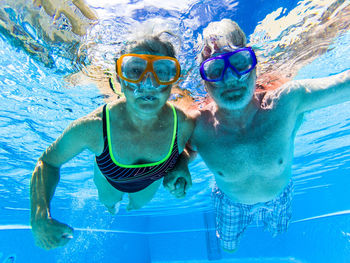 High angle view of man swimming in pool