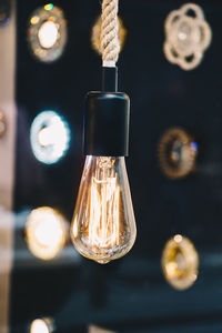 Close-up of illuminated light bulb