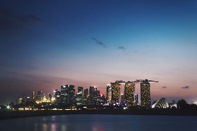 Illuminated marina bay sands during twilight