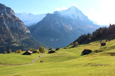 Scenic view of landscape and mountains against sky