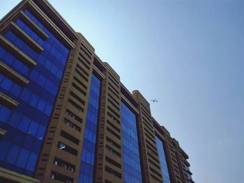 Low angle view of modern building against clear sky