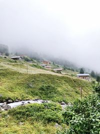 Scenic view of landscape against sky during winter