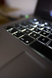 Close-up of computer keyboard on table