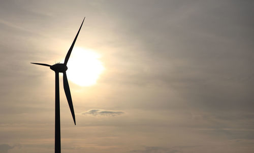 Low angle view of wind turbine