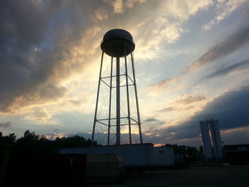 Low angle view of cloudy sky at sunset