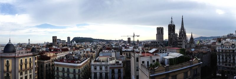 High angle view of buildings in city against sky