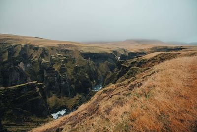 Scenic view of canyon against sky