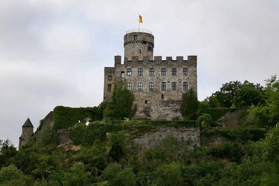 Low angle view of old ruins against sky