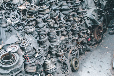 Close-up of objects on metal grate