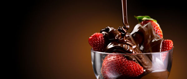 Close-up of fruits against black background