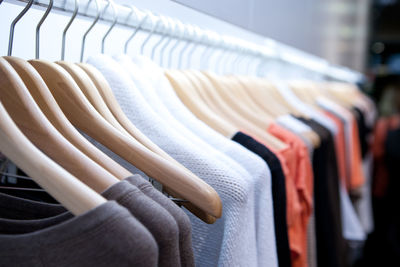 Clothes drying on rack at store