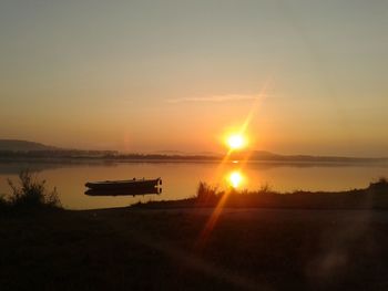 Scenic view of sunset over sea