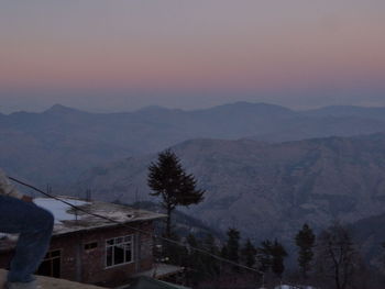 Houses in village during sunset