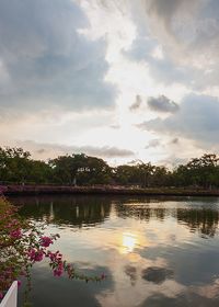 Scenic view of lake against sky during sunset