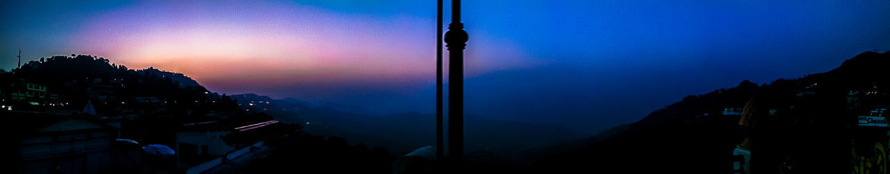 View of landscape against sky at sunset
