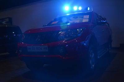 View of illuminated car in city at night