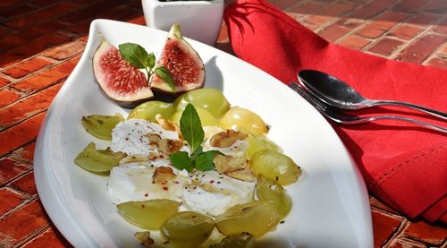 Close-up of fruits in plate