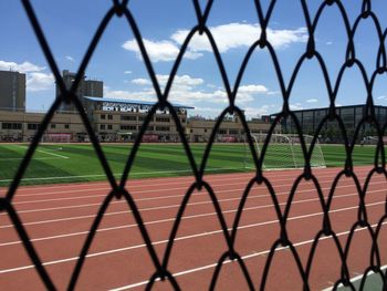 Chainlink fence seen through chainlink fence