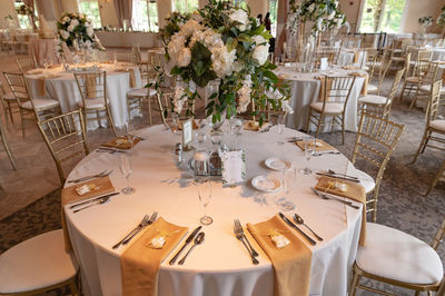 Empty chairs and tables in restaurant