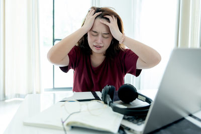 Woman working on table