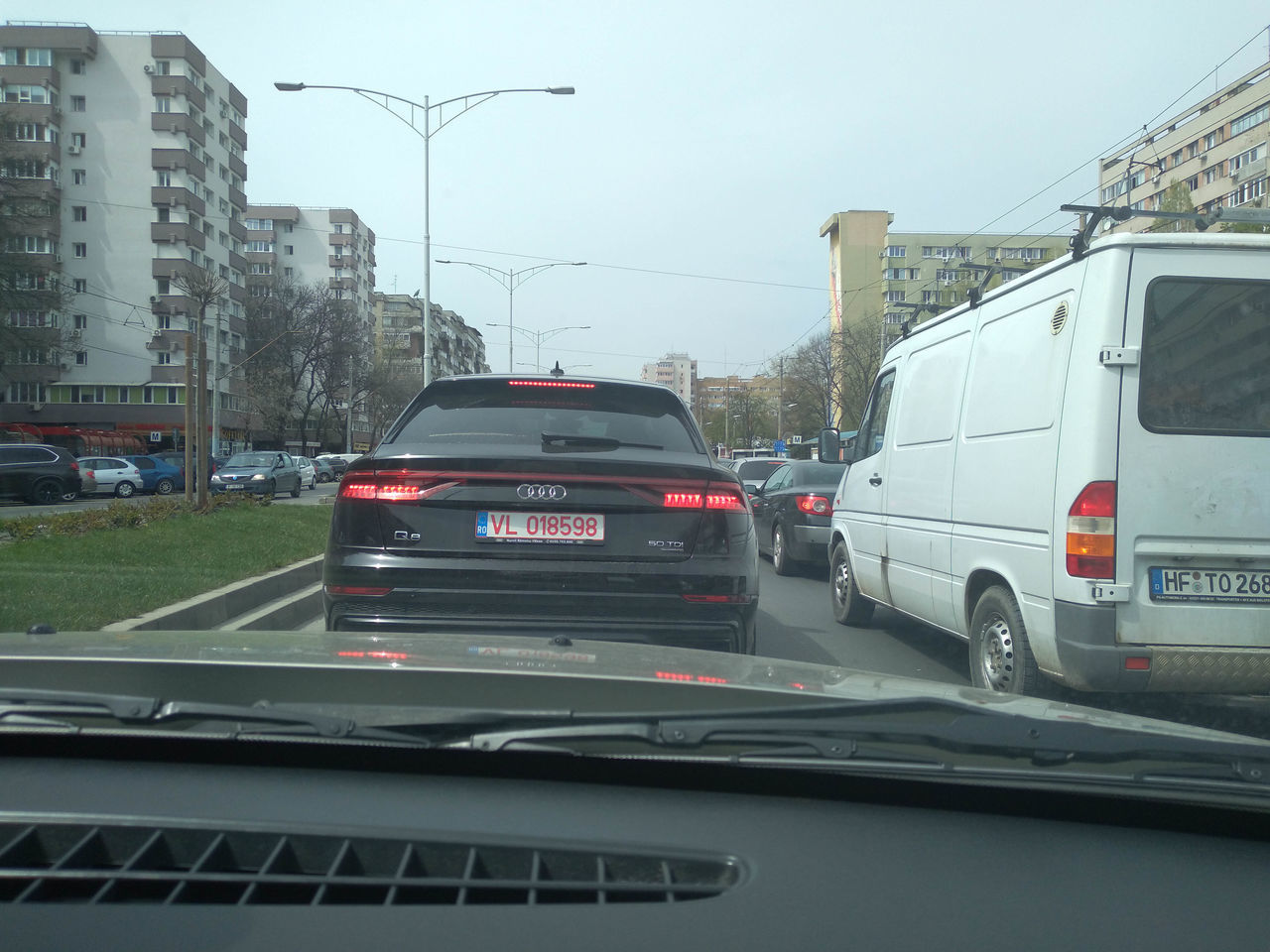 CARS ON STREET IN CITY