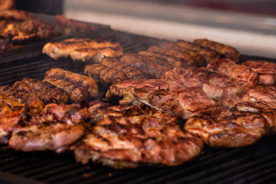 Close-up of meat on barbecue grill