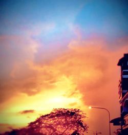 Low angle view of dramatic sky during sunset