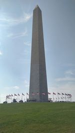 Low angle view of monument on field