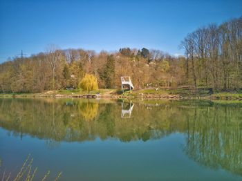 Scenic view of lake by trees against sky landingbridge fellbach 