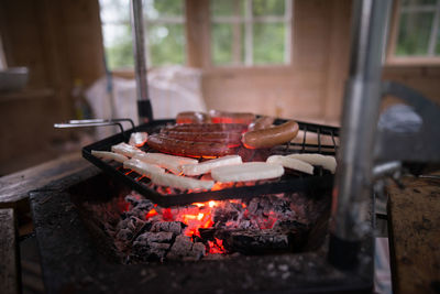 Close-up of meat on barbecue grill