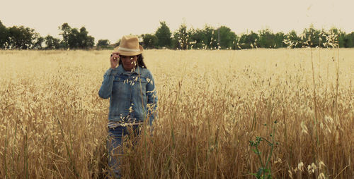 Woman standing on field