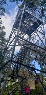 Low angle view of ferris wheel against sky