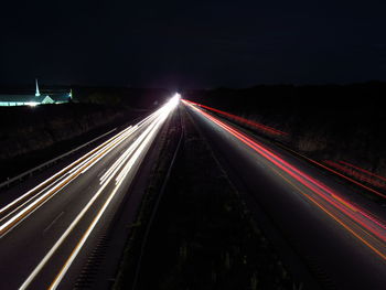 Light trails on road at night