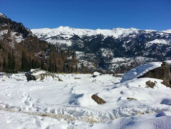 Scenic view of mountains against clear sky