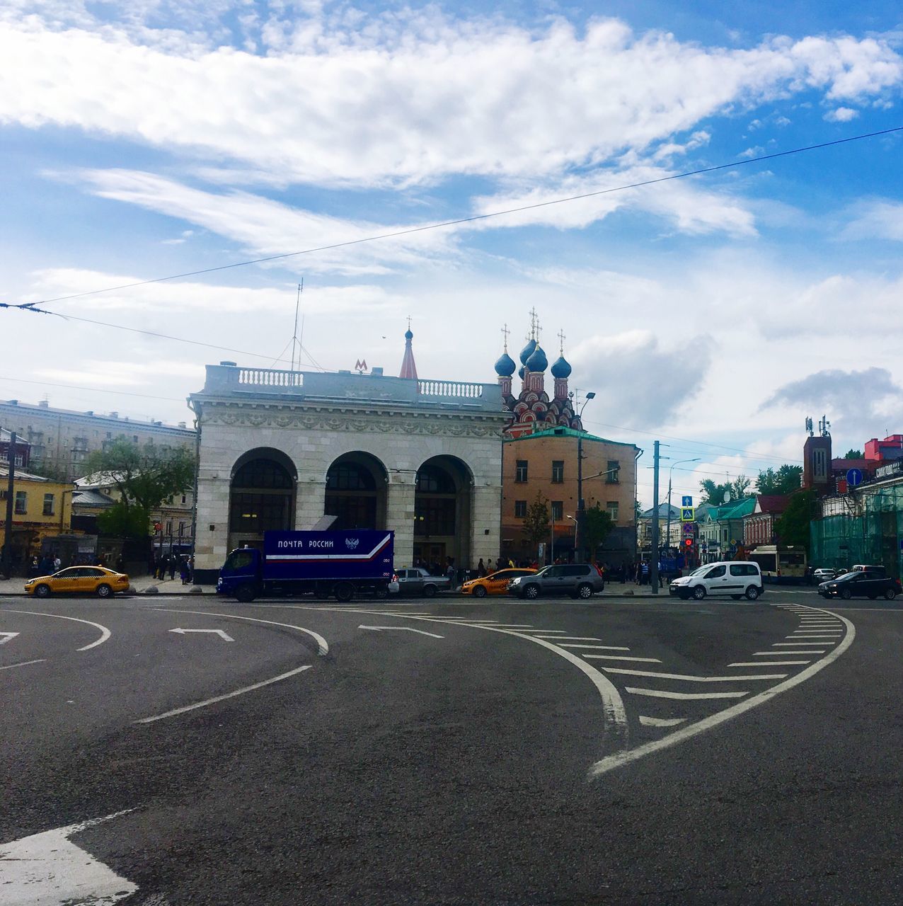 cloud - sky, sky, built structure, architecture, transportation, road, building exterior, car, travel destinations, street, land vehicle, travel, day, city, outdoors, triumphal arch, no people