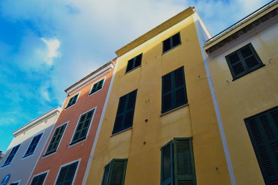 Low angle view of office building against sky