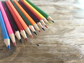 High angle view of colored pencils on table