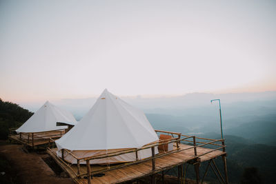 Tent on mountain against clear sky