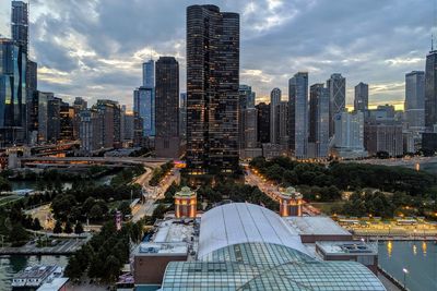 Modern buildings in city against sky