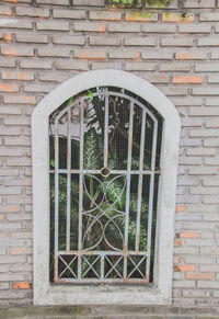 Window on brick wall of building