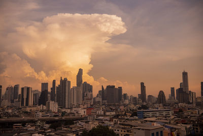 Cityscape against sky during sunset