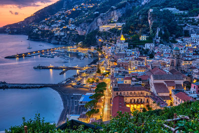 View of amalfi after sunset on the coast of the same name in italy