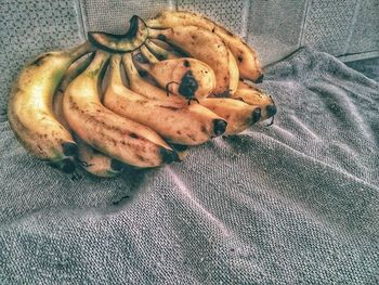 High angle view of bread on bed