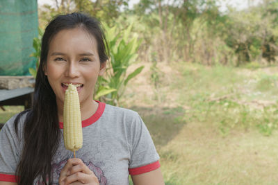 Portrait of smiling girl holding ice cream