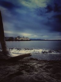 Scenic view of sea against cloudy sky